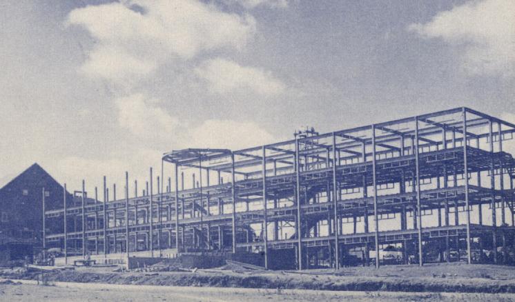 Historical black and white photo of the construction of Feagin Hall at East Texas Baptist University.