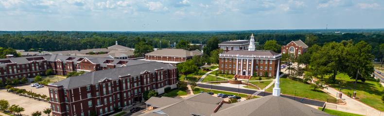 A drone shot of East Texas Baptist University on a sunny, blue-sky day.